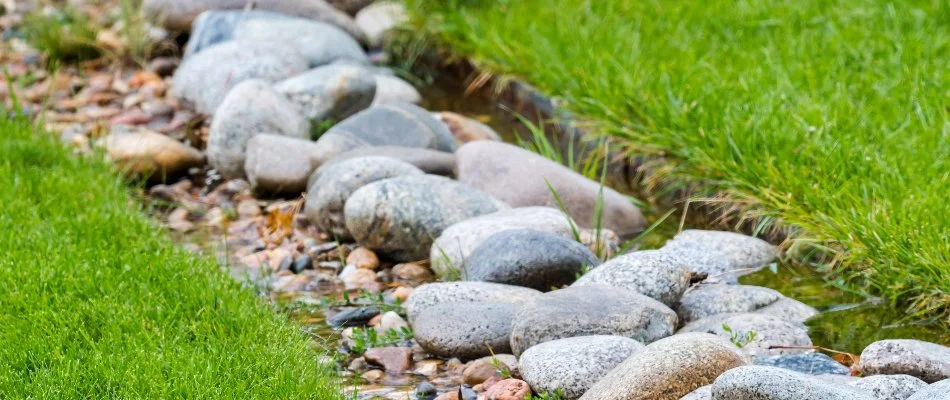 Water flowing through a dry creek bed in Cary, NC.