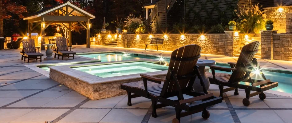 Pavilion and lounge chairs around a pool in Holly Springs, NC.