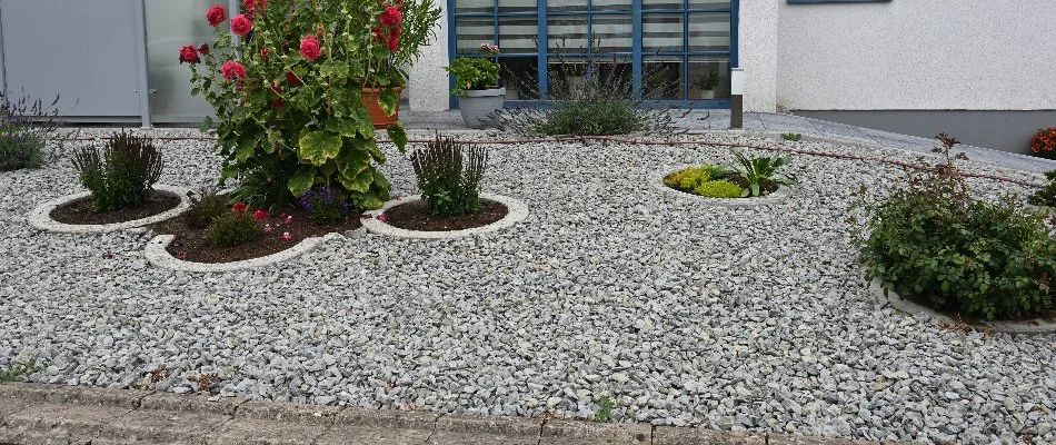 A landscape bed filled with rocks on a property in Cary, NC.