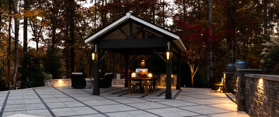 Pavilion in Cary, NC, with dining area surrounded by trees.