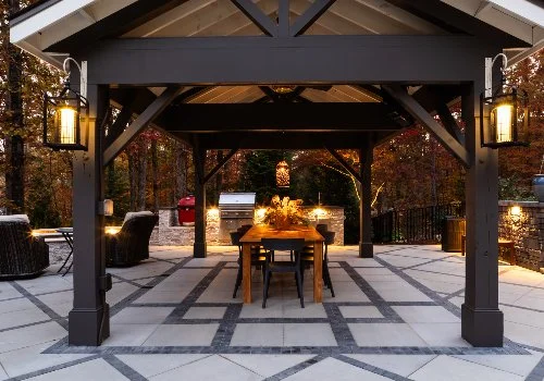 Outdoor kitchen with black pergola