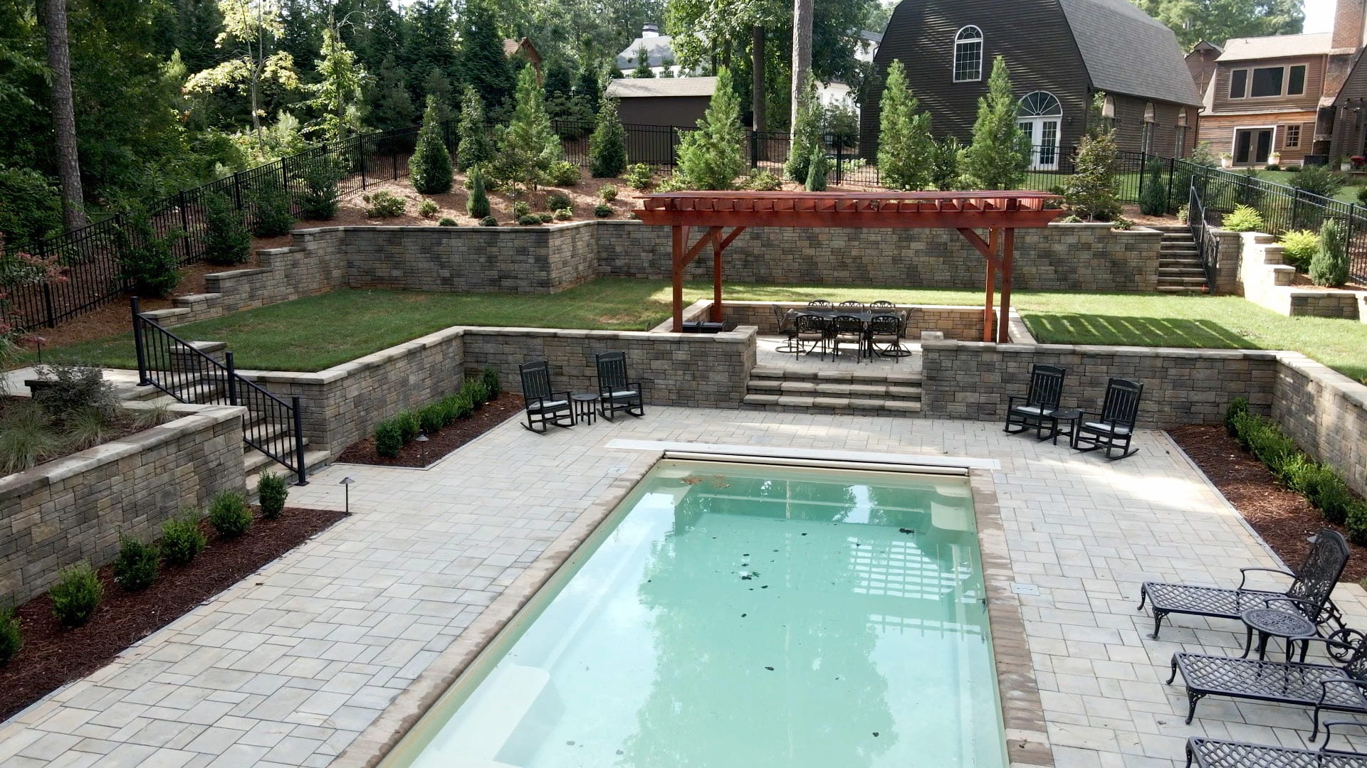 A beautiful backyard pool and hardscape job completed by Agape
